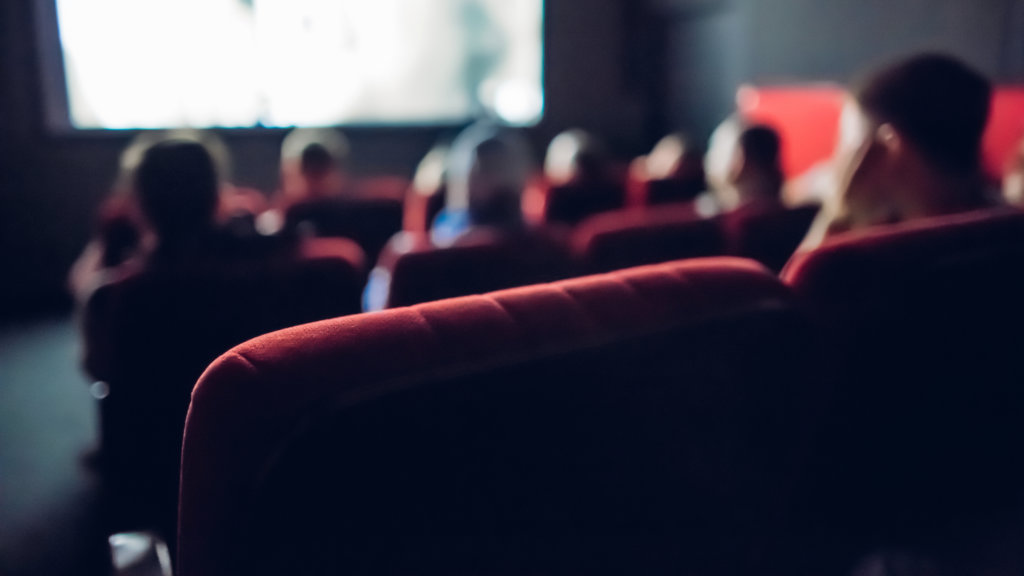 A focused shot of a seat in a movie theater