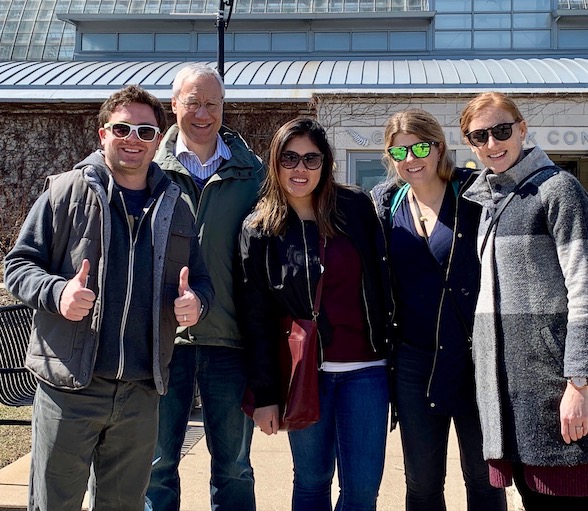 Tourists posing and smiling in Chicago