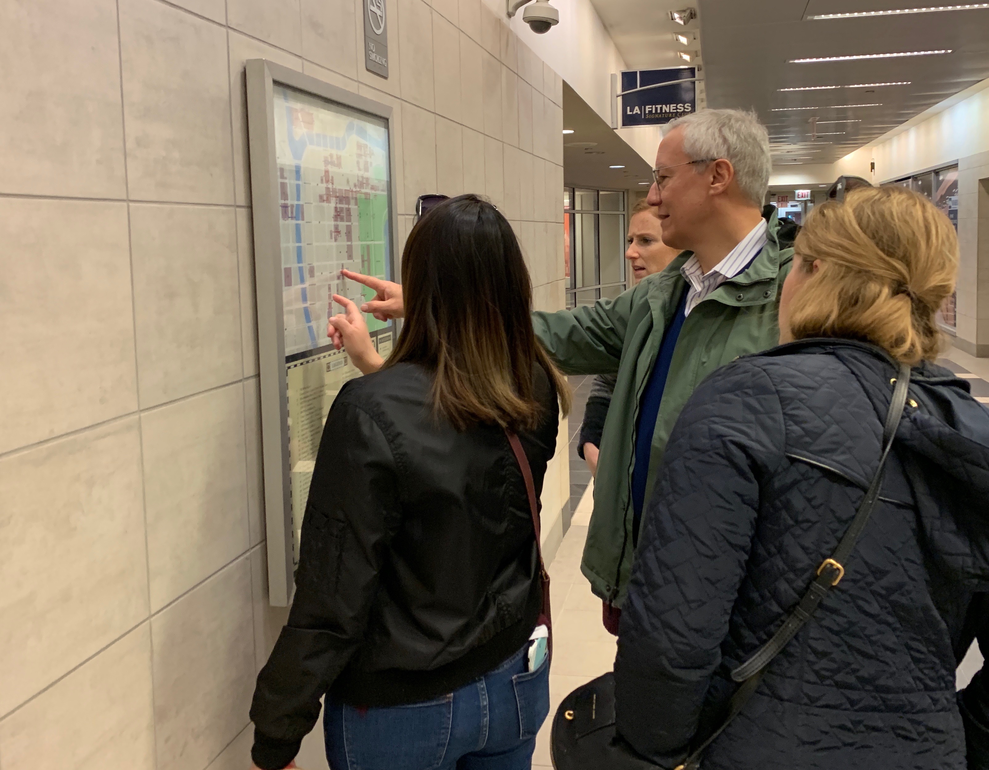 People on Tour looking at Map in the Pedway in Chicago