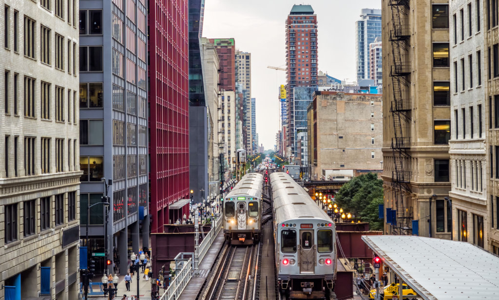 Elevated Train Tracks above the streets and between buildings at The Loop in Chicago